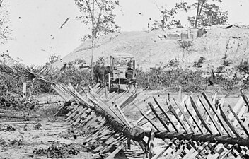 Confederate Army fortification around Atlanta with photographers' buggy in the background, 1864