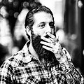 Image 113A man with sleeve tattoos, beard and flannel shirt, mid 2010s (from 2010s in fashion)