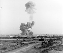 a mushroom cloud rises hundreds of feet from the site of the 1983 Beirut barracks bombing