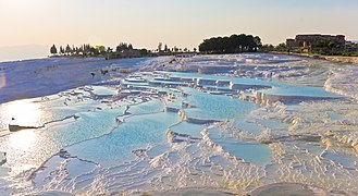 Aegean Region: Pamukkale in Denizli Province has snow-white color from travertine buildup.[334]