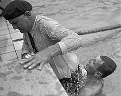 Boiteux helps his father climb out