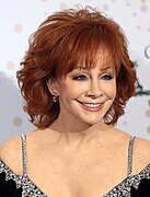 A head shot of singer Reba McEntire.