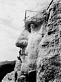 Image 15 Construction of Mount Rushmore Photo credit: Rise Studio The construction of Mount Rushmore, a United States National Monument depicting the heads of four U.S. Presidents carved into the Black Hills of South Dakota, began on August 10, 1927, with the bust of George Washington. This first phase was completed in seven years (partial completion in 1932 shown here), culminating in its unveiling in 1934. The remaining three heads—Thomas Jefferson, Abraham Lincoln, and Theodore Roosevelt—took only an additional seven years to complete. More selected pictures