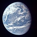 Image 78A view of Earth with its global ocean and cloud cover, which dominate Earth's surface and hydrosphere; at Earth's polar regions, its hydrosphere forms larger areas of ice cover. (from Earth)