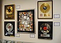 Image 30Platinum records by Elvis Presley, Prince, Madonna, Lynyrd Skynyrd, and Bruce Springsteen, at Julien's Auctions (from Album era)