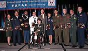 Nine servicemembers representing the four active duty services, reserve components and the Coast Guard were presented the Federal Asian Pacific American Council's Military Meritorious Service Award during the Defense Department's Asian Pacific American Heritage Month luncheon and military awards ceremony in Arlington, Va., 2 June.