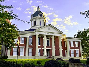 Stephens County Courthouse in Toccoa Under the USA flag is the Stephens County, GA flag.