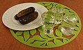 Image 14Clear vodka served with pickled cucumber – the usual way of consuming it in Slavic countries of the so-called "vodka belt". (from List of national drinks)