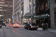 Western section of Stone Street, looking toward Broad Street, with stores on the right