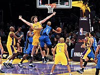 Vince Carter driving to the basket against Pau Gasol, 2010