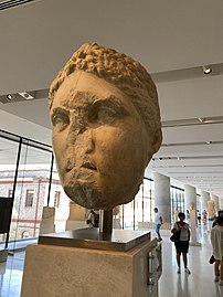 Statue head of Artemis Brauronia, possibly by Praxiteles, c. 330 BC. Found at the Sanctuary of Artemis Brauronia at the Acropolis.