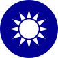 A blue circular emblem on which sits a white sun composed of a circle surrounded by 12 rays.