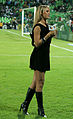 Image 130Sports anchor wearing little black dress and knee-high boots, Mexico, 2010 (from 2010s in fashion)