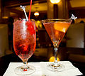 Image 34Mixed drinks: a non-alcoholic Shirley Temple (left) and alcoholic Cosmopolitan (right) (from List of drinks)