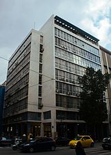 An office building on Stadiou Street designed in c. 1960 by Emmanouil Vourekas and Periklis Sakellarios.[42]
