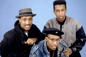 Tony! Toni! Toné! photographed in 1988 D'Wayne Wiggins (left), Timothy Christian Riley (top right), and Raphael Saadiq (bottom)