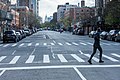 Jogger crosses in empty New York City street during COVID19 quarantine