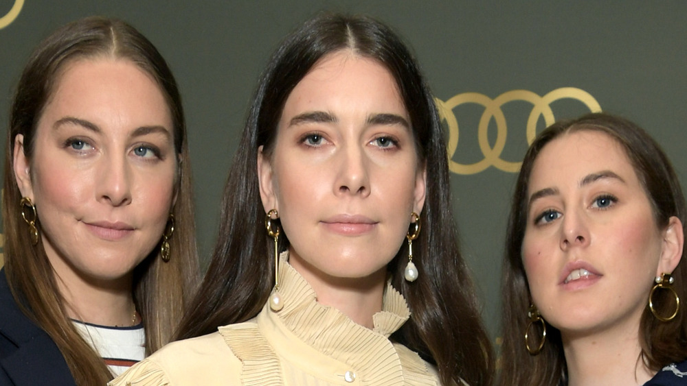 The band Haim posing