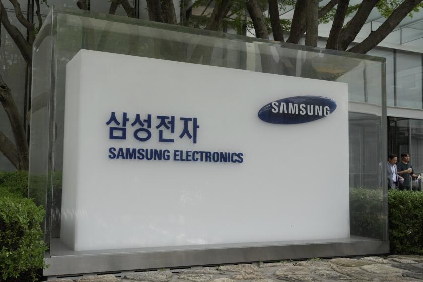 FILE - The logo of the Samsung Electronics Co. is seen at its office in Seoul, South Korea, Wednesday, July 31, 2024. (AP Photo/Ahn Young-joon, File)