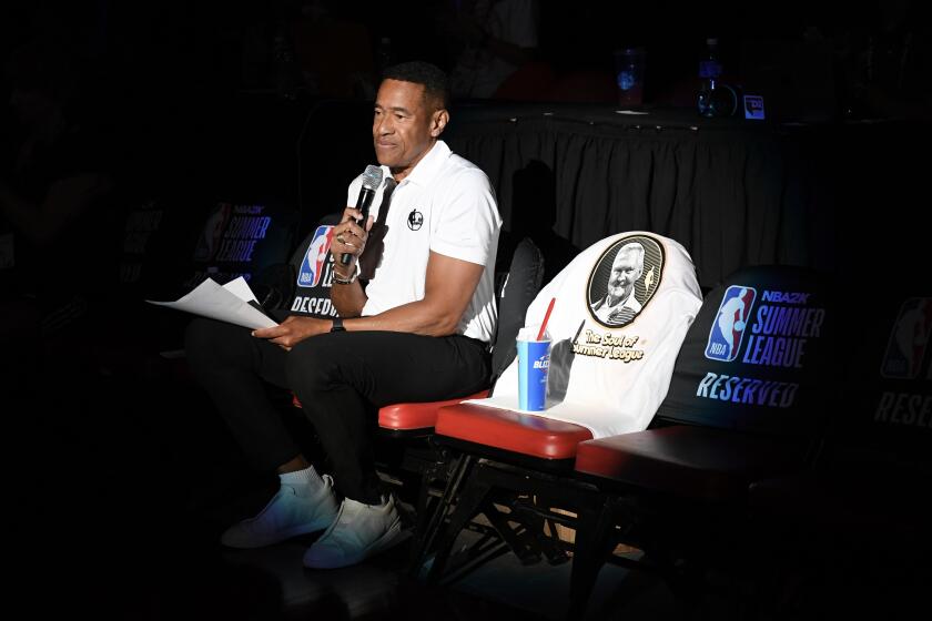 LAS VEGAS, NEVADA - JULY 12: ESPN play by play announcer Mark Jones pays tribute to NBA legend Jerry West before the start of a 2024 NBA Summer League game between the New Orleans Pelicans and the Minnesota Timberwolves at the Thomas & Mack Center on July 12, 2024 in Las Vegas, Nevada. NOTE TO USER: User expressly acknowledges and agrees that, by downloading and or using this photograph, User is consenting to the terms and conditions of the Getty Images License Agreement. (Photo by Candice Ward/Getty Images)