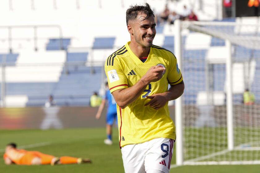 Colombia's Tomas Angel celebrates scoring his side's 4th goal against Slovakia during a FIFA U-20 World Cup round of 16 soccer match at the Bicentenario stadium in San Juan, Argentina, Wednesday, May 31, 2023. (AP Photo/Ricardo Mazalan)