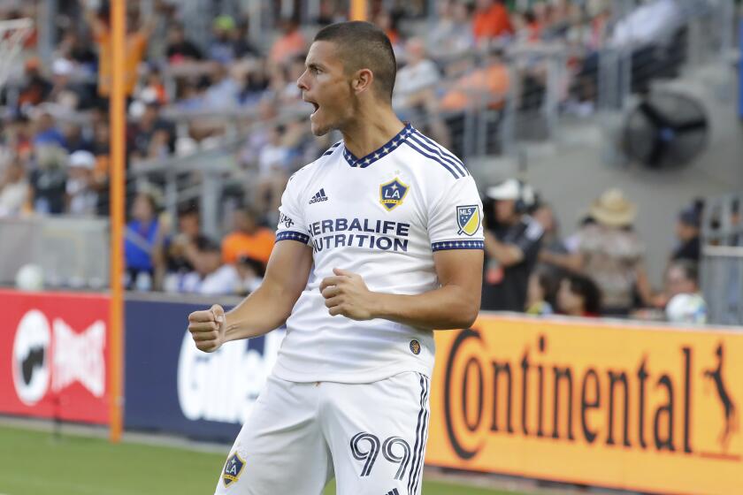 Los Angeles Galaxy forward Dejan Joveljic celebrates his goal against the Houston Dynamo.