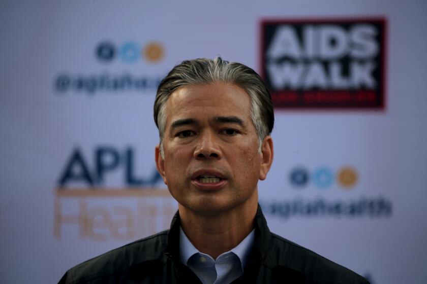 LOS ANGELES, CALIF. - DEC. 10, 2021. California Attorney General Rob Bonta holds a news conference on Friday, Dec 10, 2021, to share tips and resources on how to avoid scams while making charitable donations during the holiday season. . (Luis Sinco / Los Angeles Times)