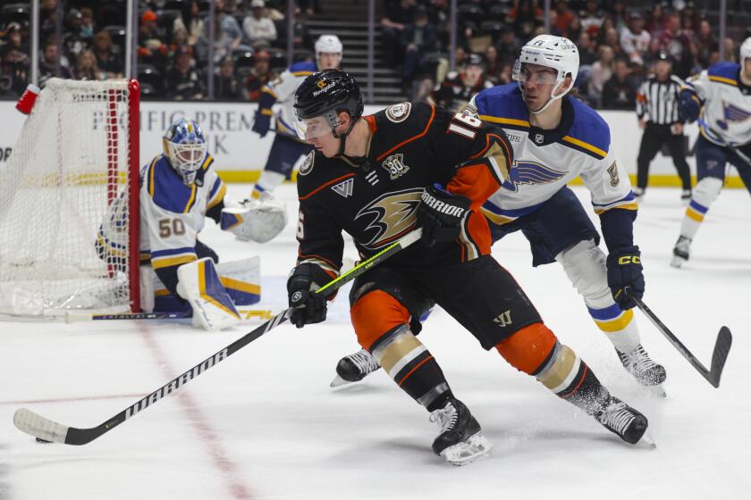 Anaheim Ducks center Ryan Strome (16) moves the puck as St. Louis Blues defensemen.