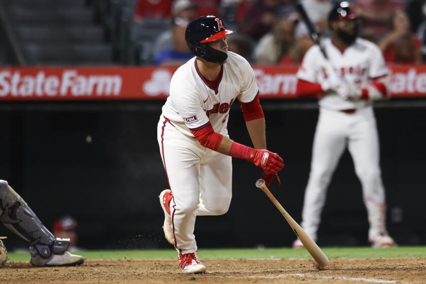 Los Angeles Angels' Matt Thaiss hits an RBI single during the eighth inning of a baseball game against the Colorado Rockies in Anaheim, Calif., Tuesday, July 30, 2024. (AP Photo/Jessie Alcheh)