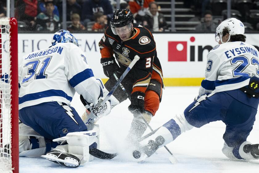 Anaheim Ducks center Ben Meyers shoot as Tampa Bay Lightning goaltender Jonas Johansson (31) and center Michael Eyssimont.