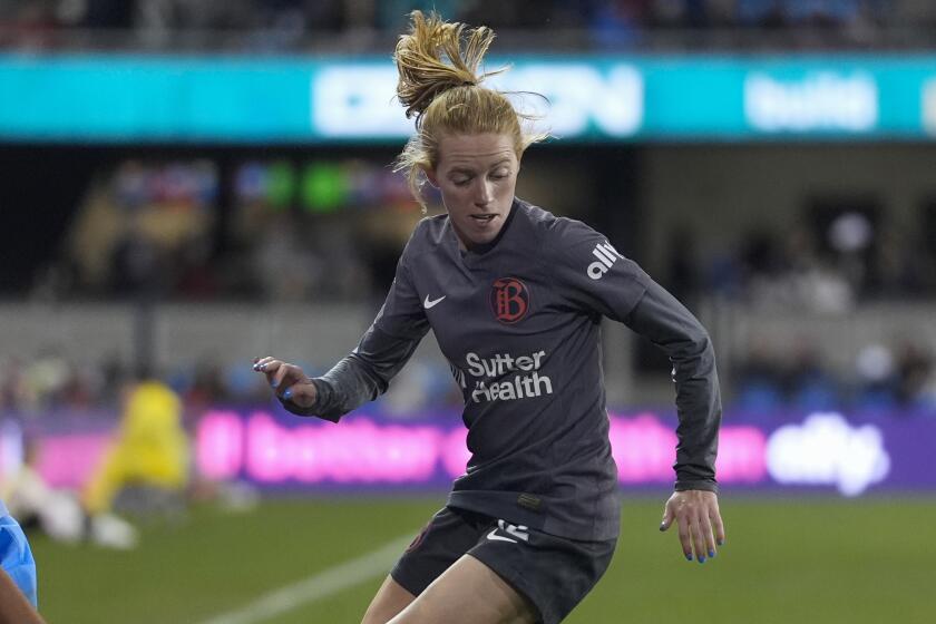 Bay FC forward Tess Boade, right, moves the ball while defended by Houston Dash.