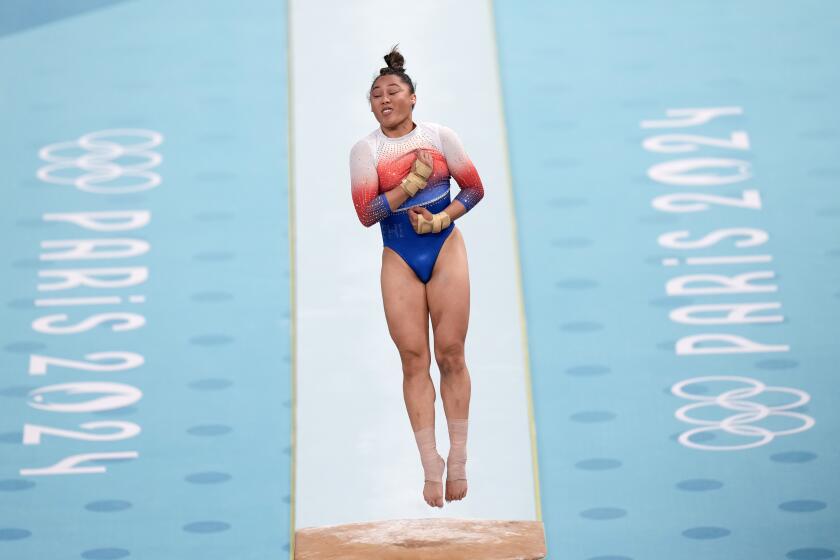 Emma Malabuyo, of Philippines, competes on the vault during a women's artistic gymnastics qualification round at Bercy Arena at the 2024 Summer Olympics, Sunday, July 28, 2024, in Paris, France. (AP Photo/Francisco Seco)