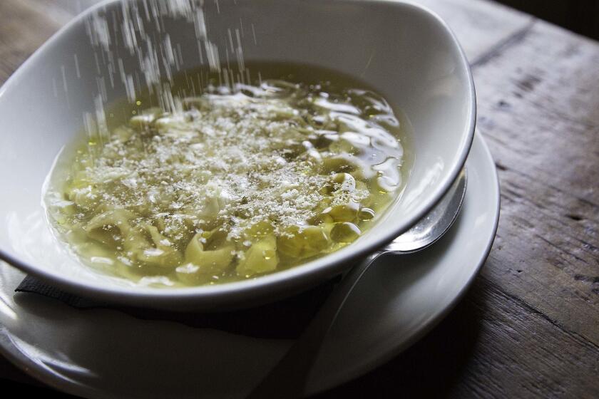 Sotto chef and owner Steve Samson has filling in and is ready to fold and roll tortellini in brodo, a Bolognese New Year's staple at his restaurant in Los Angeles.