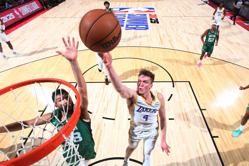 LAS VEGAS, NV - JULY 15: Dalton Knecht #4 of the Los Angeles Lakers drives to the basket.