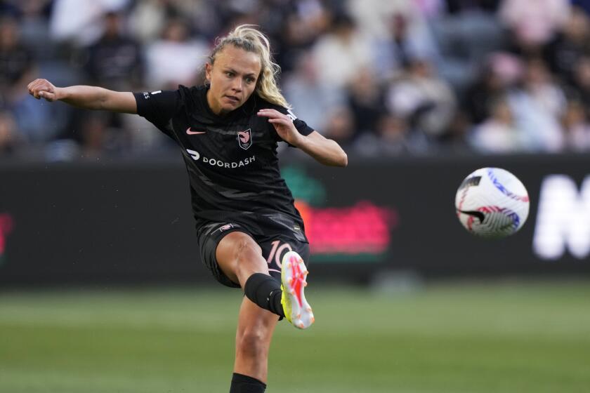 Angel City FC Claire Emslie (10) passes against Bay FC during an NWSL soccer match.