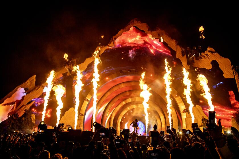 Travis Scott performs on day one of the Astroworld Music Festival at NRG Park on Friday, Nov. 5, 2021, in Houston. (Photo by Amy Harris/Invision/AP)