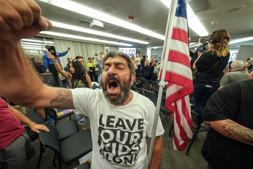 ORANGE CA SEPTEMBER 9, 2023 - Manuk Grigoryan reacts during Orange Unified School District board meeting, Thursday, September 7, 2023 in Orange, California. (Photo by Ringo Chiu / For The Times)