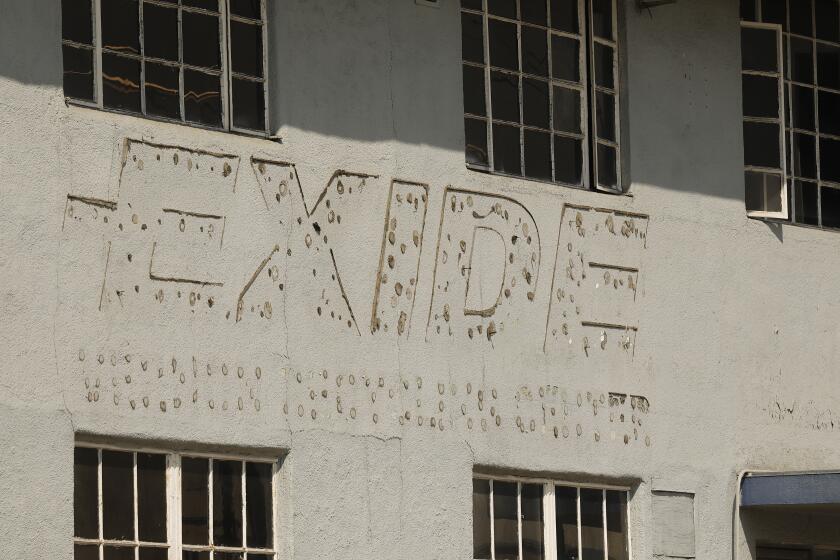 LOS ANGELES, CA - OCTOBER 06: Portions of the Exide Technologies, lead-acid battery recycling plant located in Vernon are wrapped in white plastic even as a press conference with state and local elected leaders was held at Resurrection Church in the Boyle Heights neighborhood of Los Angeles to express their opposition to Exide's proposed bankruptcy settlement, specifically in regard to the option for Exide to fully abandon the facility in Vernon and its responsibility to clean the environmental damage it caused. Resurrection Church on Tuesday, Oct. 6, 2020 in Los Angeles, CA. (Al Seib / Los Angeles Times