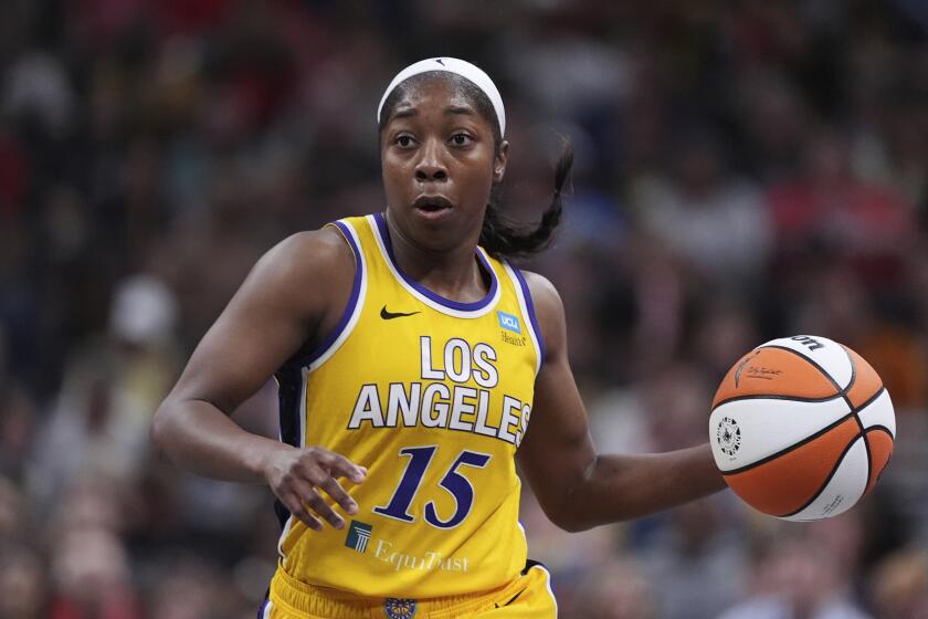 Los Angeles Sparks guard Aari McDonald (15) plays against the Indiana Fever.