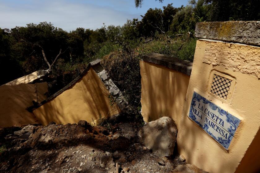 PALOS VERDES, CA - MAY 29, 2024 - A wall of a homeowner's property in the Abalone Cove neighborhood is damaged by the ongoing shifting of ground in the Portuguese Bend area of Rancho Palos Verdes on May 29, 2024. Dewatering wells and pumps have been installed in Abalone Cove to divert groundwater which has been cited as a main cause for the shifting ground in the community and causing damage to homes, roads and water lines in Abalone Cove. (Genaro Molina/Los Angeles Times)