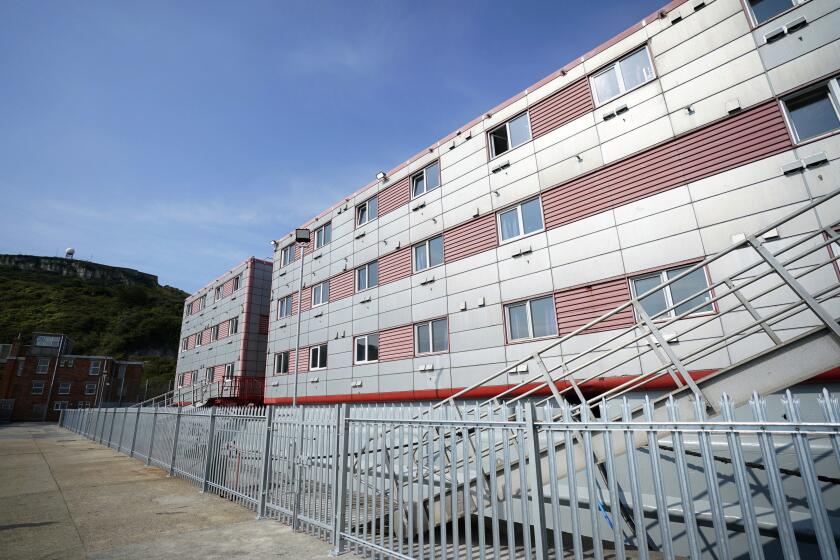 FILE - A view of the Bibby Stockholm accommodation barge, which would have housed up to 500 asylum seekers, at Portland Port in Dorset, England, on July 21, 2023. The British government said Tuesday, July 23, 2024, it would scrap the controversial use of a barge to house migrants off the south coast of England as part of its immigration system overhaul. (Andrew Matthews/Pool Photo via AP, File)