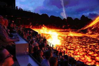 Audience members watch the Seek immersive show experience at Cosm.