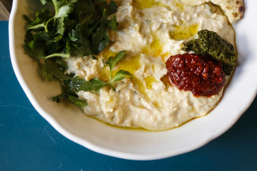 LOS ANGELES, CA -- THURSDAY JUNE 30, 2018--Msabaha, a chunky hummus at Bavel's restaurant. (Maria Alejandra Cardona / Los Angeles Times)