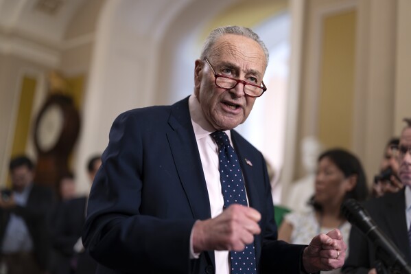 Senate Majority Leader Chuck Schumer, D-N.Y., speaks to reporters following a Democratic strategy session, at the Capitol in Washington, Tuesday, May 21, 2024. Schumer is planning to take another vote Thursday on border security and immigration legislation that Republicans blocked in February. (AP Photo/J. Scott Applewhite)