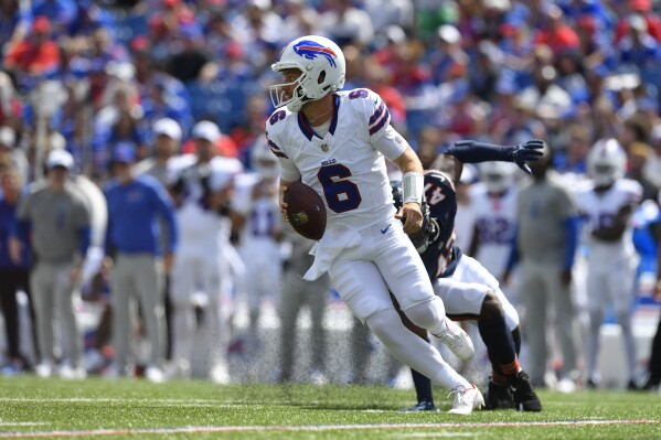 Buffalo Bills quarterback Shane Buechele (6) runs during the second half of an preseason NFL football game against the Chicago Bears, Saturday, Aug. 10, 2024, in Orchard Park, NY. (AP Photo/Adrian Kraus)