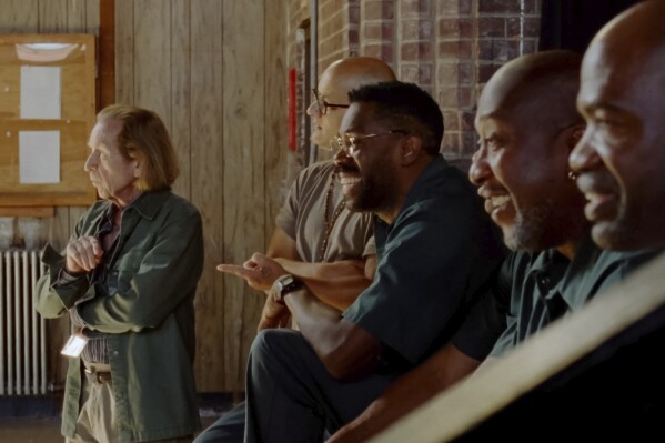 This image released by A24 shows, from left, Paul Raci, Sean San José, Colman Domingo, Sean "Dino" Johnson, and Mosi Eagle from "Sing Sing." (A24 via AP)