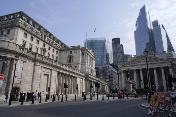 The Bank of England in London, Thursday, Aug. 1, 2024. Economists are divided as to whether the Bank of England, which is independent of government, will cut its main interest rate by a quarter-point from the current 16-year high of 5.25%, or hold off until September.(AP Photo/Alberto Pezzali)