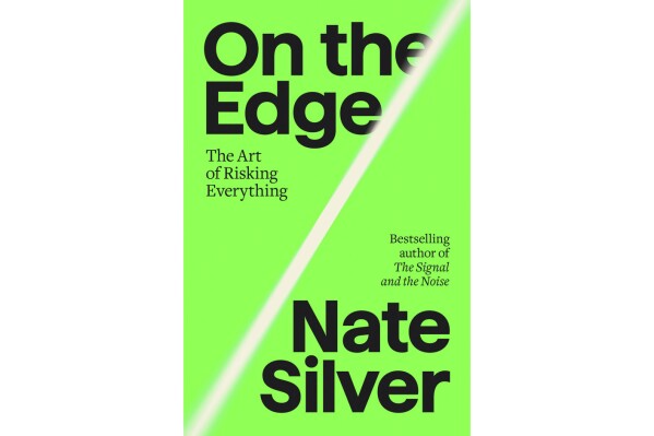 This book cover image released by Penguin Press shows "On the Edge: The Art of Risking Everything" by Nate Silver. (Penguin Press via AP)