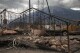 FILE - Damage is seen after a wildfire in Jasper, Alberta, Friday July 26, 2024. (Amber Bracken/The Canadian Press via AP, File)