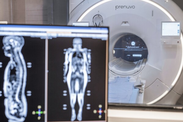 This photo provided by Prenuvo in July 2024 shows an MRI scanner. Magnetic resonance imaging uses magnetic fields to produce detailed images of organs, bones and other structures inside the body. Unlike many other types of scans, MRIs don't use radiation. (Prenuvo via AP)